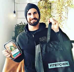 Seth Rollins collecting his healthy meal prep order