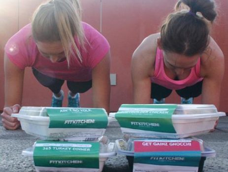 Two girls doing plank