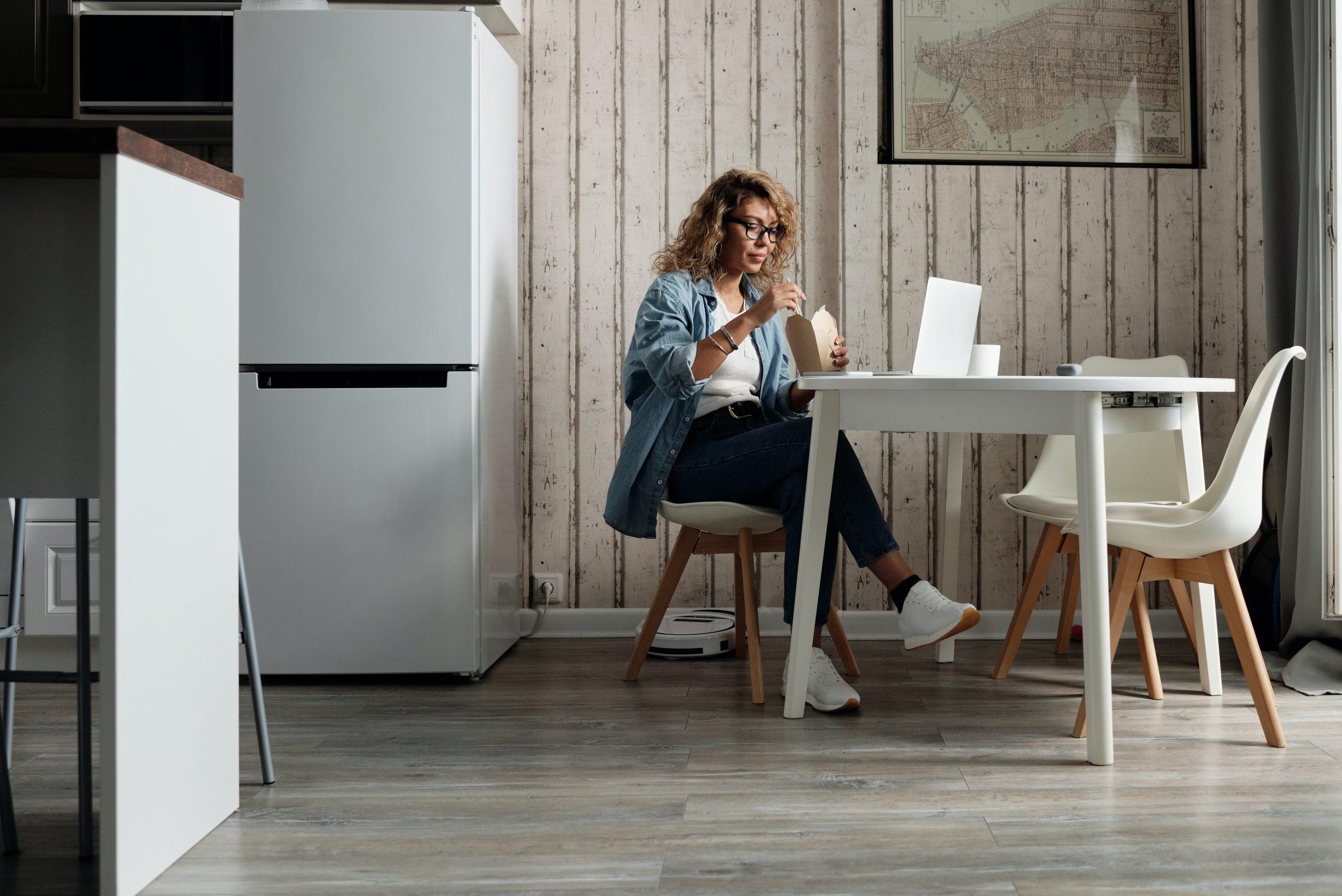 Woman sitting on a chair and eating something