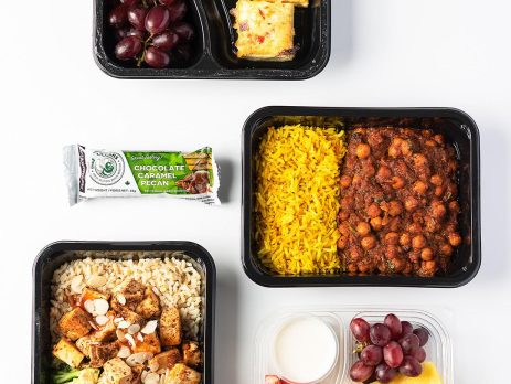 Bunch of healthy meal prep options placed on a white background